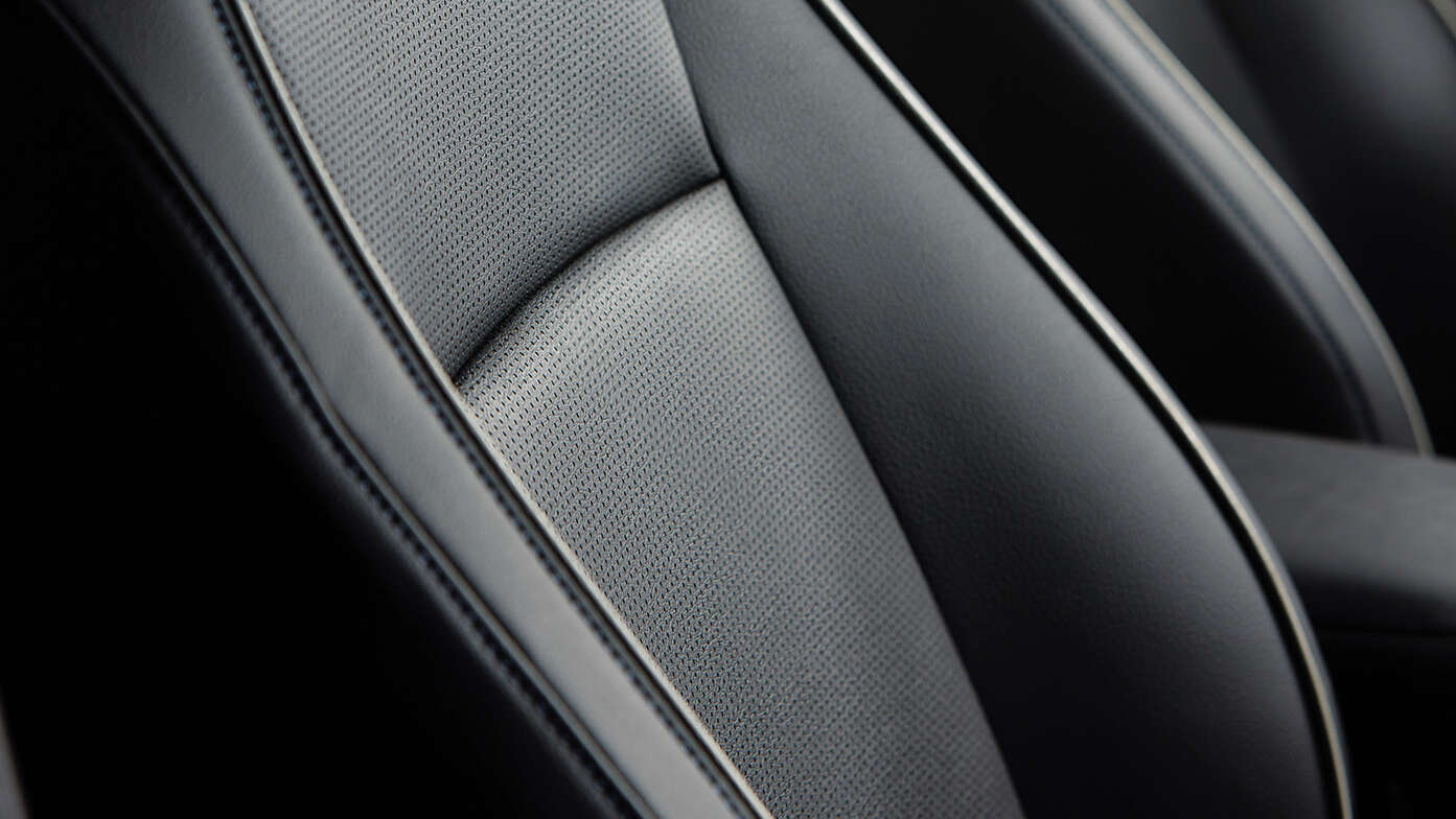Honda e:Ny1, Nahaufnahme eines der ergonomischen Kunstledersitze.