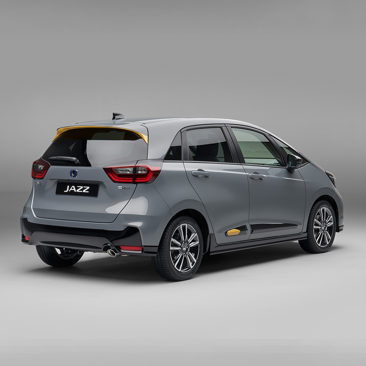 Honda eSymo vor einer bunten Wand