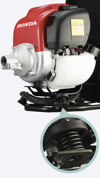 Rückentragbare Honda Freischneider, Nahaufnahme des Motors, Fokus auf Antivibrationsrahmen.