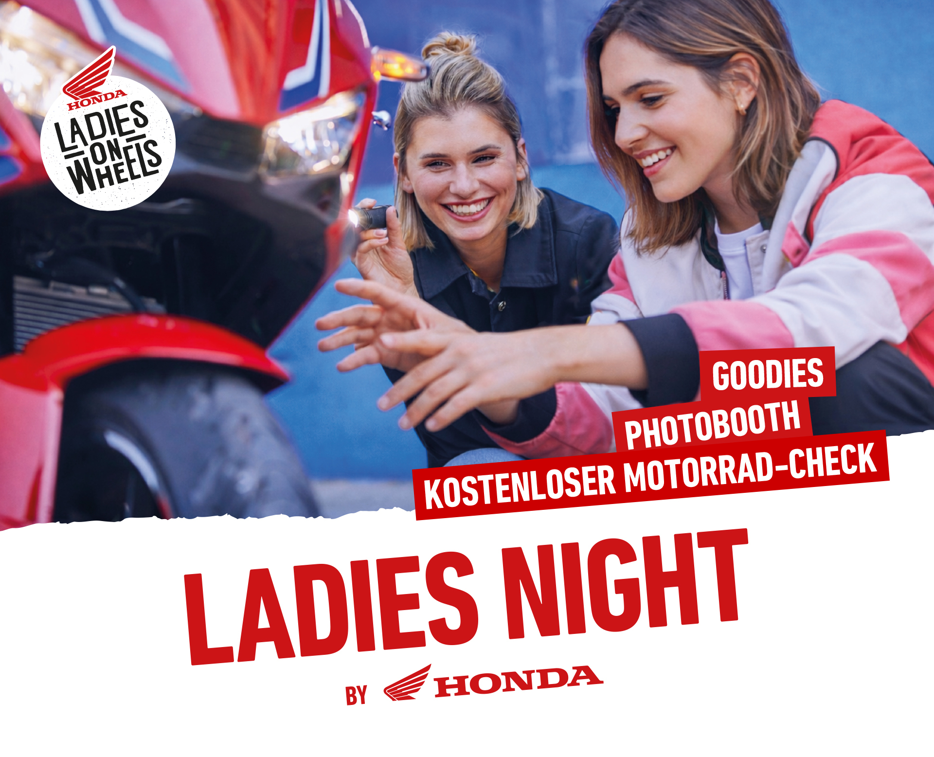 Girl explaining motorbike mechanics to another 